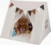 A beige teepee tent filled with teddy bears and colorful balls. Náhled obrázku produktu