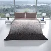 A bed with a duvet set is placed in front of a large window with a view of a landscape. Produktbild-Vorschau