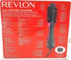 The image shows the packaging of a Revlon hair dryer and volumizer. The packaging is red and features text and diagrams describing the product's features. Podgląd zdjęcia produktu