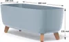 A light gray planter with wooden legs is shown against a white background, with dimensions indicated by arrows and text. Náhľad obrázku produktu