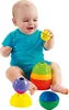 A baby is playing with stacking cups. Produktbild-Vorschau
