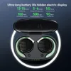 Close-up of black wireless earbuds in an open charging case, with glowing green accents and marketing text about battery life. Náhled obrázku produktu