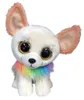 A plush toy chihuahua with large, glittery eyes and a rainbow-colored ruff around its neck sits facing the camera. Podgląd zdjęcia produktu