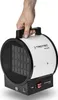 A hand holding a portable electric heater. Produktbild-Vorschau
