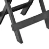 A close-up view of the black plastic legs of a folding table. Produktbild-Vorschau