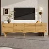 A modern living room scene featuring a wooden TV cabinet with a TV mounted above it. Produktbild-Vorschau