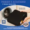 A person is holding a black car seat booster cushion in front of a washing machine. Produktbild-Vorschau