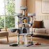 A multi-level cat tree with two cats, placed in a living room setting with a window and sofa in the background. Produktbild-Vorschau