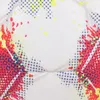 A close-up view of a soccer ball with a colorful, abstract design. Produktbild-Vorschau