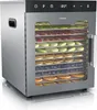 A stainless steel food dehydrator with multiple trays filled with various dried fruits and berries, shown on a white reflective surface. Produktbild-Vorschau