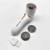 A white electric callus remover with rose gold accents and accessories on a marbled surface. Produktbild-Vorschau