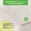 A close-up view of a white upholstered surface, likely a cosmetic chair or bed, with marketing text and icons highlighting its features. Produktbild-Vorschau