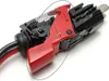 A close-up view of a red and black trigger switch mechanism for a vacuum cleaner. Produktbild-Vorschau