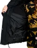 Close-up view of the inside of a black jacket, showing pockets and lining. Náhľad obrázku produktu