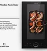 A close-up of a black induction cooktop with sausages and vegetables cooking on it, with product information text on the left. Produktbild-Vorschau