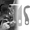A sewing machine in use and two spare parts for it. Produktbild-Vorschau