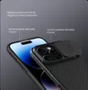Close-up of a black iPhone case with a sliding camera cover, highlighting raised edges for protection. Náhled obrázku produktu