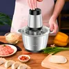 A person is using a food processor on a wooden table with various ingredients around it. Produktbild-Vorschau