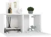 A white wall-mounted cabinet with two open compartments, displaying decorative items and books. Produktbild-Vorschau