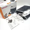 A product shot of a Beurer foot warmer, including its packaging and instruction manual. Produktbild-Vorschau