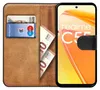 A book-style phone case with a phone inside, showing cards and cash in the wallet section. Produktbild-Vorschau