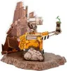 A Wall-E figurine on a rocky base with a backdrop of a rocky landscape. Anteprima dell’immagine prodotto