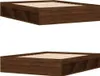 Two views of a brown wooden bed frame with storage compartments. Produktbild-Vorschau
