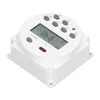 A white electronic timer with a digital display and buttons, shown from a slightly elevated angle on a white background. Voir les images du produit