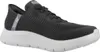 A single black and gray Skechers Slip-Ins shoe is shown from a side angle against a white background. Anteprima dell’immagine prodotto