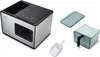 A product shot of an ice maker and its accessories on a white background. Produktbild-Vorschau