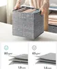 A person is holding a grey fabric storage box filled with folded clothes. Below are two diagrams comparing material thickness and density. Produktbild-Vorschau
