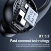 Close-up view of the internal components of a black wireless earbud, highlighting the Bluetooth chip and circuitry. Podgląd zdjęcia produktu