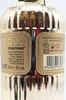 A close-up of a gold-colored bottle label with product information. Anteprima dell’immagine prodotto
