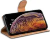 A book-style phone case with a smartphone inside, displayed on a white background. Produktbild-Vorschau
