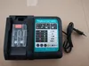 A black and green battery charger with indicator lights and a power cord. Produktbild-Vorschau