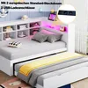 A white daybed with a pull-out trundle bed, featuring shelves and integrated lighting. The image also shows a close-up of a power strip with USB ports. Produktbild-Vorschau