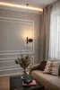 A living room scene with a sofa, curtains, and decorative elements. Anteprima dell’immagine prodotto