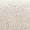 A close-up, textured view of a cream-colored bouclé fabric. Anteprima dell’immagine prodotto