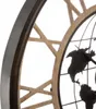 A close-up view of a wall clock with a world map design. Voir les images du produit