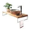 A bathroom vanity console with a sink, faucet, and a towel. Náhled obrázku produktu