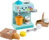 A toy coffee maker set for children, including a coffee maker, mug, cups, a croissant, and a scoop, arranged on a white background. Produktbild-Vorschau