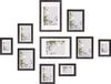 A collection of empty picture frames arranged in a gallery wall style on a white background. Produktbild-Vorschau