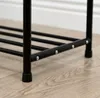 Close-up of the black metal frame of a shoe rack, showing the legs and shelves. Náhľad obrázku produktu