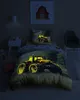 A child's bedroom with a bed featuring tractor-themed bedding. Produktbild-Vorschau
