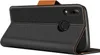 A black flip case for a Huawei P20 Lite phone, shown from the back with the cover open. Podgląd zdjęcia produktu