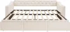 A beige upholstered sofa bed with the mattress frame extended. Anteprima dell’immagine prodotto