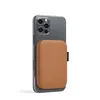 A smartphone with a brown magnetic power bank attached to its back. Anteprima dell’immagine prodotto