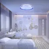 A children's bedroom with two beds, a desk, and a wall mural. Náhled obrázku produktu
