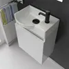 A modern bathroom vanity with a sink and faucet. Produktbild-Vorschau