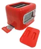 A red toaster with its crumb tray partially extended and a red lid in front of it, set against a white background. Voir les images du produit